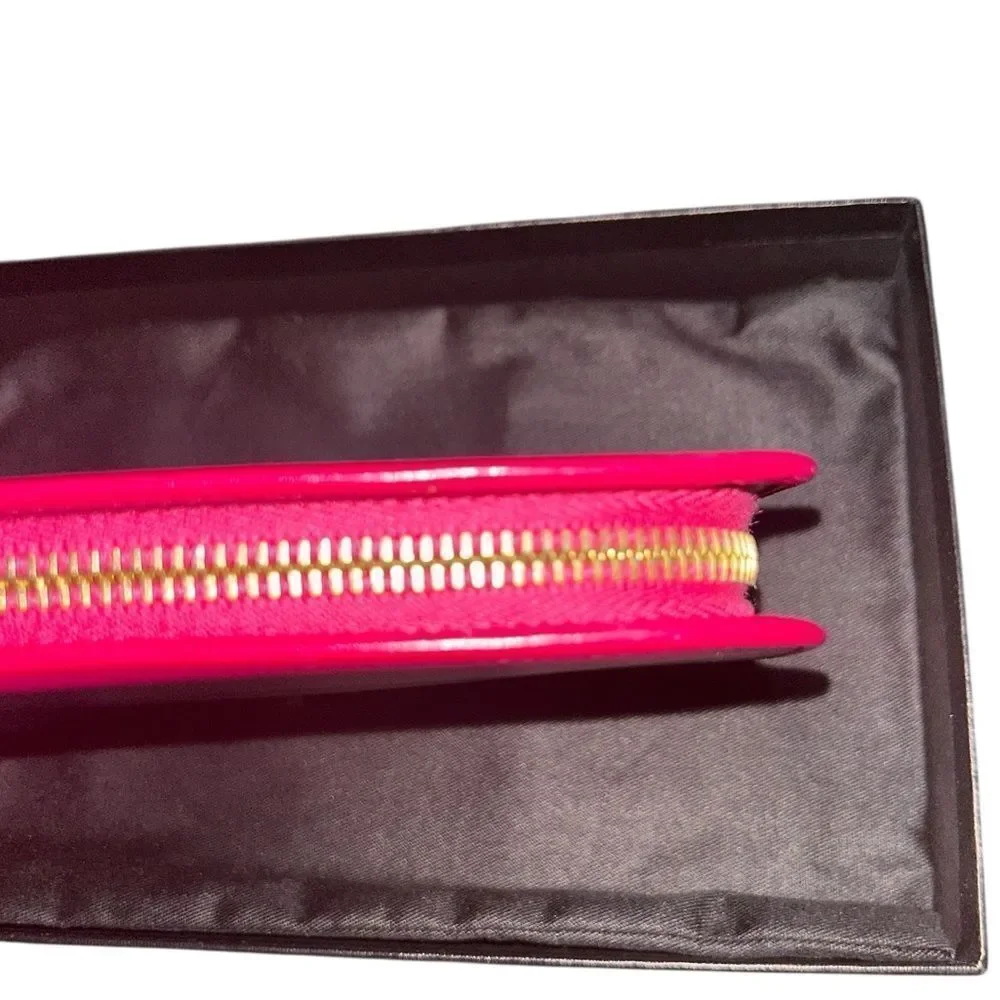 Authentic Saint Laurent Pink Zippy Wallet